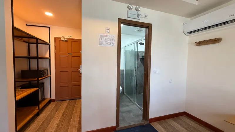 Room 101 — entrance and bathroom