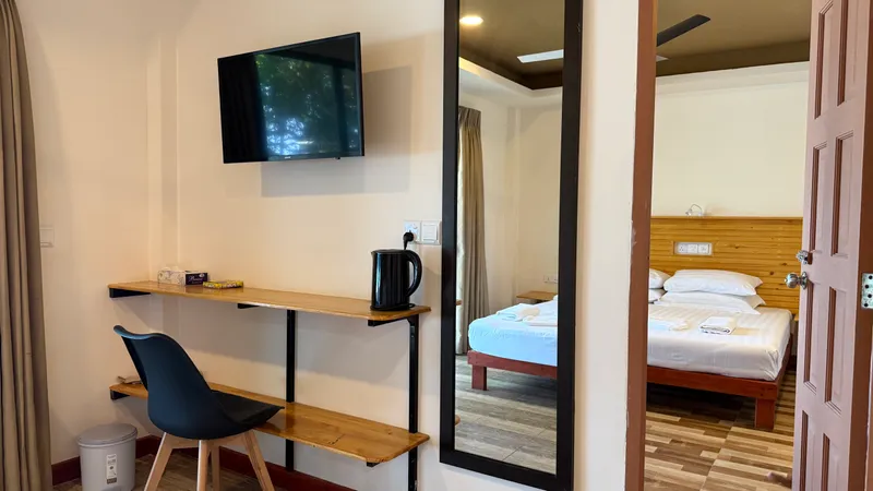 Room 101 — desk and amenities